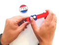 Magnet dispenser with maximum dimensions of height 3 mm and Ø10 mm, red block and blue button of plastic