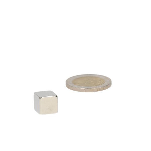 Neodymium cube magnet 10 mm silver next to coin for bowl professional applications powerful magnets