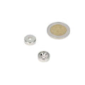 Silver-coloured neodymium pot magnet 13 x 4.5 mm with boron-zinc hole next to euro coin for magnetic force scale