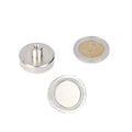Silver-coloured powerful magnetic pot magnet 25 x 7 mm neodymium with m4 threaded bush and smooth surface next to euro coin for shell
