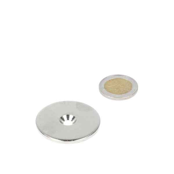 Silver ring-shaped disc with boron-zinc holes and concentric edges of high-grade steel for various applications