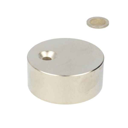 Silver neodymium magnetic disc with countersunk hole and matching circular hood for a wide range of applications